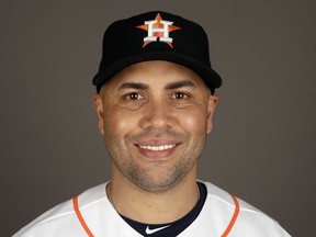 FILE - This is a 2017 file photo showing Carlos Beltran of the Houston Astros. Beltran is retiring after winning his first World Series title in his 20th major league season. The 40-year-old made the announcement Monday, Nov. 13, 2017, 12 days after the Astros beat the Los Angeles Dodgers in Game 7 of the World Series. (AP Photo/David J. Phillip, File)