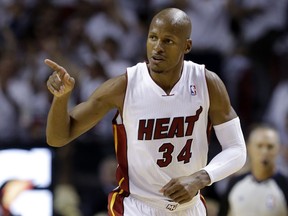 FILE - In this May 30, 2014, file photo, Miami Heat guard Ray Allen gestures after scoring a three-point basket during the first half of Game 6 in the NBA basketball playoffs Eastern Conference finals against the Indiana Pacers, in Miami.  Retired NBA star Ray Allen believes he is a victim of "catfishing," and has asked a court to throw out a case where he is accused of stalking someone he met online. Allen filed an emergency motion in Orange County, Florida, on Tuesday,Nov. 21, 2017, one day after Bryant Coleman told the court he is being stalked by the 10-time All-Star and two-time NBA champion. (AP Photo/Lynne Sladky, File)