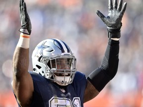 FILE - In this Nov. 6, 2016, file photo, Dallas Cowboys running back Ezekiel Elliott celebrates his touchdown in the first half of an NFL football game against the Cleveland Browns in Cleveland. A federal appeals court says Elliott can play in Sunday's home game against Kansas City. The 2nd U.S. Circuit Court of Appeals in New York on Friday, Nov. 3, 2017, temporarily blocked a lower-court ruling that required Elliott to begin serving a six-game suspension. (AP Photo/David Richard, File)