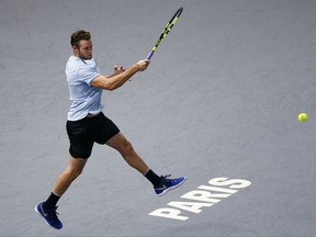 FILE - In this Nov. 5, 2017, file photo, Jack Sock returns the ball to Filip Krajinovic, of Serbia, during their final match of the Paris Masters tennis tournament in Paris, France. Sock compiled a 3-4 record at Grand Slam tournaments this year, making it as far as the third round only once. During one stretch at lower-tier events, he lost five consecutive matches. Still, the 25-year-old American turned things around at the end of the season, so much so that he ended up making his top-10 debut in the rankings and will be participating in the ATP Finals for the first time, starting with a match against 19-time major champion Roger Federer on Sunday in London. (AP Photo/Francois Mori, File)
