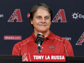 FILE - In this May 17, 2014, file photo, Tony La Russa, newly hired as chief baseball officer for the Arizona Diamondbacks, speaks to reporters after being introduced in Phoenix. The Boston Red Sox have hired La Russa  to serve as a vice president and special assistant on its baseball operations staff, the announced Thursday, Nov. 2, 2017.  He served the past four seasons as the Arizona Diamondbacks chief baseball analyst, advising Arizona's baseball operations department.  (AP Photo/Matt York, File)