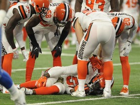 FILE - In this Nov. 12, 2017, file photo, Cleveland Browns outside linebacker Jamie Collins stays on the ground after a tackle by Detroit Lions offensive guard Graham Glasgow during the first half of an NFL football game, in Detroit. Browns starting linebacker Jamie Collins is done for the season with a sprained right knee ligament. (AP Photo/Jose Juarez, File)