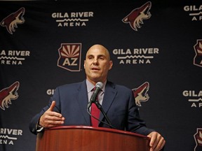 FILE - In this July 13, 2017, file photo, Rick Tocchet, the new coach of the Arizona Coyotes, speaks during a news conference in Glendale, Ariz. Tocchet will get his third Pittsburgh Penguins Stanley Cup ring, second as an assistant coach after one as a player, when he visits as coach of the Arizona Coyotes on Tuesday night, Nov. 7, 2017. (AP Photo/Ross D. Franklin, File)