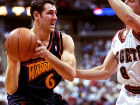 FILE - In this April 14, 2000, file photo, Denver Nuggets guard Chris Herren (8) tries to contain Golden State Warriors guard Sam Jacobson (6) during the first quarter of an NBA basketball game in Denver. Former NBA player Jacobson has pleaded guilty to a fraud charge stemming from the sale of a Minnesota home. Jacobson pleaded guilty Monday, Nov. 13, 2017, to residential mortgage fraud. His wife, Traci Jacobson, pleaded guilty to aiding and abetting. They'll be sentenced Jan. 29. (AP Photo/Jack Dempsey, File)