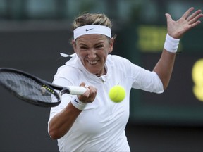 FILE - In this July 3, 2017, file photo, Victoria Azarenka, of Belarus, returns to CiCi Bellis during a match on the opening day at the Wimbledon Tennis Championships in London. Former No. 1 VAzarenka says she will sit out the Fed Cup final between Belarus and the United States because of an ongoing custody dispute with her baby's father. Azarenka tweeted about her absence from Belarus' team on Tuesday, Nov. 7, 2017. (AP Photo/Tim Ireland, File)