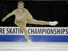 FILE - In this Jan. 21, 2017, file photo, Gracie Gold performs during the women's free skate at the U.S. Figure Skating Championships in Kansas City, Mo. Gold has withdrawn from the national championships while she continues to seek treatment for depression, anxiety and an eating disorder. Gold announced last month that she was withdrawing from her Grand Prix assignments, and her decision to skip the nationals in January ends any chance of her competing at next year's Winter Olympics. (AP Photo/Charlie Riedel, File)