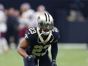 FILE - In this Nov. 19, 2017, file photo .New Orleans Saints cornerback Marshon Lattimore (23) warms up for the team's NFL football game against the Washington Redskins in New Orleans. Lattimore did not practice Wednesday, Nov. 22, because of a left ankle injury which occurred in last Sunday's victory. A first-round draft choice and the Saints' top cornerback this season, Lattimore limped through the locker room wearing a protective boot on his lower left leg while it was open to reporters. (AP Photo/Butch Dill, File)