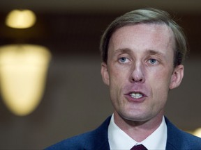 FILE - In this Friday, Sept. 4, 2015 file photo, former Hillary Rodham Clinton aide Jake Sullivan speaks to reporters on Capitol Hill in Washington, following a day of testifying behind closed doors to the House committee investigating the deadly Benghazi, Libya attacks. The senior policy adviser to Clinton's 2016 presidential campaign, security adviser to Vice President Joe Biden, and former director of Policy Planning at the State Department, was the target of three phishing emails at his campaign address in March 2016 and at least 10 of them at his Gmail address from March to May 2016. (AP Photo/Cliff Owen)