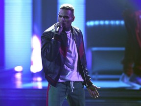 FILE - In this Sunday, June 25, 2017, file photo, Chris Brown performs at the BET Awards at the Microsoft Theater in Los Angeles. Brown released a 45-song album "Heartbreak on a Full Moon" on Tuesday, Oct. 31. (Photo by Matt Sayles/Invision/AP, File)