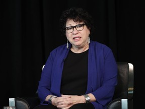 FILE- In this Sept. 21, 2017, file photo, Supreme Court Justice Sonia Sotomayor speaks the Newseum in Washington. Sotomayor is working on three books for young people, Penguin Young Readers told The Associated Press on Thursday, Nov. 2. She will be adapting her best-selling memoir "My Beloved World" for middle-graders. She will collaborate with illustrator Lulu Delacre on a picture book autobiography, "Turning Pages." And she and illustrator Rafael Lopez plan a picture book about "childhood differences." (AP Photo/Carolyn Kaster, File)