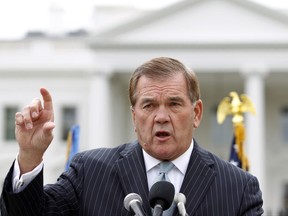 FILE - In this Oct. 22, 2011, file photo, former Secretary of Homeland Security Tom Ridge speaks to a crowd of hundreds protesting in front of the White House in Washington. A spokesman says Ridge is in critical condition after undergoing an emergency heart procedure at a hospital in Austin, Texas. (AP Photo/Jose Luis Magana, File)