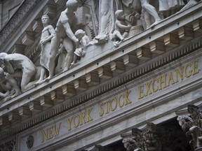 FILE - This Wednesday, July 8, 2015, file photo shows the exterior of the New York Stock Exchange. Strong quarterly earnings from Wal-Mart Stores, Cisco Systems and other companies drove U.S. stocks higher in morning trading Thursday, Nov. 16, 2017, as the market bounced back from a modest decline a day earlier. (AP Photo/Bebeto Matthews, File)