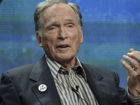 FILE - In this July 23, 2014 file photo, Dick Cavett speaks on stage during the "Dick Cavett's Watergate" panel at the PBS 2014 Summer TCA held at the Beverly Hilton Hotel, in Beverly Hills, Calif. Cavett is donating more than 2,000 episodes of his late-night talk show to the Library of Congress. The donation announced Friday, Nov. 3, 2017, by the library includes episodes of "The Dick Cavett Show" from his 35 years as host, from the 1960s to 1980s. (Photo by Richard Shotwell/Invision/AP, File)