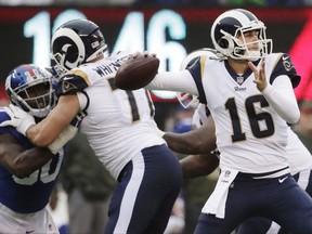 FILE - In this Sunday, Nov. 5, 2017, file photo, Los Angeles Rams' Jared Goff throws a pass during the second half of an NFL football game against the New York Giants in East Rutherford, N.J. Goff's rough rookie season is fading into memory with each outstanding performance this fall for the surging Rams.  (AP Photo/Julio Cortez, File)