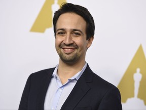 FILE - In this Feb. 6, 2017 file photo, Lin-Manuel Miranda arrives at the 89th Academy Awards Nominees Luncheon in Beverly Hills, Calif.  Miranda will be honored Thursday at the Latin Grammys with the Latin Recording Academy President's Merit Award for his outstanding and numerous contributions to the Latin community. (Photo by Jordan Strauss/Invision/AP, File)