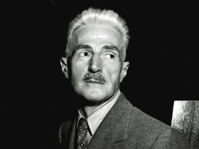 FILE - In this Nov. 7, 1947 file photo, novelist Dashiell Hammett, author of "The Maltese Falcon" and "The Thin Man," appears in New York. A Hammett story about a tormented killer is being published for the first time in more than 90 years. "The Glass That Laughed" first ran in the November 1925 issue of True Police Stories, a magazine which lasted just two years. It will run online Wednesday in Electric Literature (https://electricliterature.com). (AP Photo, File)