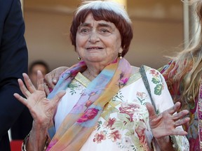 FILE - In this May 19, 2017 file photo, filmmaker Agnes Varda appears at the screening of the film "Visages, Villages," at the 70th international film festival, Cannes, southern France. Varda will receive an honorary Oscar at this year's annual Governor Awards in Los Angeles.  (AP Photo/Thibault Camus, File)