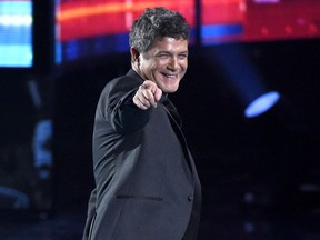 FILE - In this Nov. 19, 2015 file photo, Alejandro Sanz reacts after winning the award for best contemporary pop vocal album for "Sirope" at the 16th annual Latin Grammy Awards in Las Vegas. Sanz will be honored as Person of the Year on Nov. 15, 2017 in Las Vegas, on the eve of the Latin Grammys. (Photo by Chris Pizzello/Invision/AP, File)