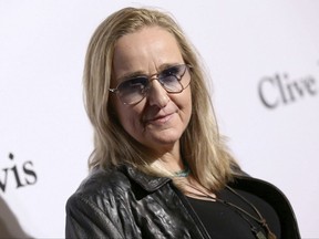 FILE - In this Feb. 14, 2016 file photo, Melissa Etheridge arrives at the 2016 Clive Davis Pre-Grammy Gala in Beverly Hills, Calif. Etheridge has pleaded guilty to a misdemeanor charge of possessing marijuana in North Dakota. An attorney for the California musician entered the plea on her behalf Tuesday. Under a proposed order, Etheridge would pay a fine of $750 and serve unsupervised probation. (Photo by John Salangsang/Invision/AP, File)