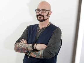 In this Nov. 7, 2017 photo, TV personality Jackson Galaxy, from the Animal Planet series, "My Cat From Hell," poses for a portrait in New York to promote his latest book, "Total Cat Mojo: The Ultimate Guide To Life With Your Cat." (Photo by Brian Ach/Invision/AP)