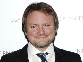 FILE - In this Jan. 8, 2013 file photo, screenwriter Rian Johnson attends the National Board of Review Awards gala in New York. The Walt Disney Co. has announced that Johnson will create a new trilogy for the "Star Wars" universe, greatly expanding the director's command over George Lucas' ever-expanding space saga. (Photo by Evan Agostini/Invision/AP, File)