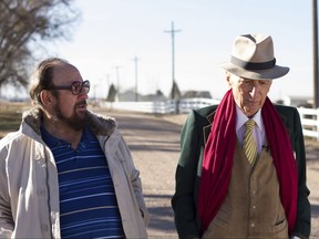 This image released by Netflix shows Gerald Foos, a former Colorado motel owner who spied on his guests, left, celebrated writer Gay Talese in the documentary "Voyeur," by filmmakers Myles Kane and Josh Koury. (Cris Moris/Netflix via AP)