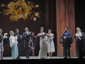 This image released by the Metropolitan Opera shows a performance of "The Exterminating Angel," will be shown in selected theaters on Saturday. (Ken Howard/Metropolitan Opera via AP)