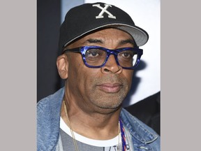 FILE - In this July 18, 2017 file photo, filmmaker Spike Lee attends the premiere of "Dunkirk" in New York. Lee spoke about racial issues and the country's divisive history Saturday, Nov. 11, at the Virginia Film Festival in Charlottesville. (Photo by Evan Agostini/Invision/AP, File)