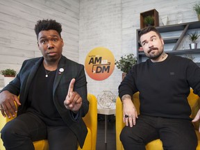 This image released by Buzzfeed shows Saeed Jones, left, and Isaac Fitzgerald, cohosts of BuzzFeed News AM to DM. Launched quietly in late September from a studio in BuzzFeed's Manhattan office, "AM to DM" is a breezy mix of news and pop culture. Viewers can click on Twitter and watch the stream live, or catch highlights later in the day.  (Drew Reynolds/Buzzfeed via AP)