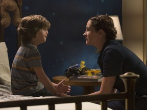 This image released by Lionsgate shows Jacob Tremblay, left, and Julia Roberts in a scene from "Wonder." (Dale Robinette/Lionsgate via AP)