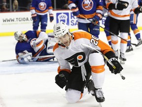 Philadelphia Flyers' Taylor Leier (20) celebrates after scoring a goal as New York Islanders goalie Thomas Greiss (1) reacts during the first period of an NHL hockey game Wednesday, Nov. 22, 2017, in New York. (AP Photo/Frank Franklin II)