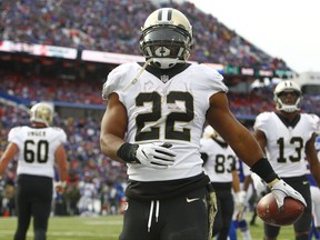 New Orleans Saints running back Mark Ingram (22) walks toward fans after scoring a touchdown during the first half of an NFL football game against the Buffalo Bills, Sunday, Nov. 12, 2017, in Orchard Park, N.Y. (AP Photo/Jeffrey T. Barnes)