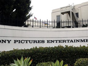 FILE - This Dec. 2, 2014 file photo shows Sony Pictures Entertainment headquarters in Culver City, Calif. Sony Pictures has pulled the film "All the Money in the World" from its AFI Fest premiere following the sexual misconduct allegations made against co-star Kevin Spacey. In a statement Monday, Nov. 6, 2017, Sony's TriStar Pictures said it was withdrawing the film from the Los Angeles festival because "it would be inappropriate to celebrate a gala at this difficult time." It had been slated to be the festival's closing night film on November 16. (AP Photo/Nick Ut, File)