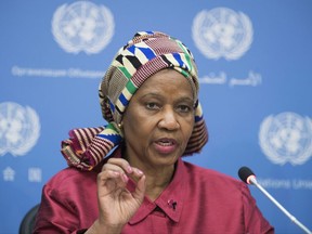 FILE - In this March 15, 2017, file photo, Phumzile Mlambo-Ngcuka, the executive director of UN Women, speaks to reporters during a news conference at U.N. headquarters. The United Nations began campaigning to end violence against women decades ago, but its effort gained little traction, until the outpouring of allegations of sexual misconduct against powerful men in Hollywood, the U.S. Congress and boardrooms put the issue on front pages and TV screens around the world. "This is the moment!" Mlambo-Ngcuka said in an interview ahead of the International Day for the Elimination of Violence against Women on Nov. 25. "It really has to come out of the woodwork." (AP Photo/Mary Altaffer, File)