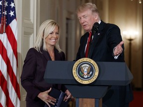 FILE - In this Oct. 12, 2017, file photo, President Donald Trump announces the nomination of Kirstjen Nielsen to be Secretary of Homeland Security, in the East Room of the White House in Washington. Nielsen was tapped to help shepherd Trump's Department of Homeland Security secretary pick through his Senate confirmation process. Now she's got her own team shepherding her. The Senate Homeland Security Committee will hold a confirmation hearing for Nielsen on Wednesday, Nov. 8. (AP Photo/Evan Vucci, File)
