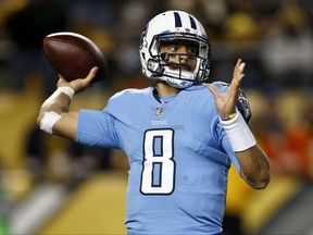 In this Nov. 16, 2017, photo, Tennessee Titans quarterback Marcus Mariota (8) plays in an NFL football game against the Pittsburgh Steelers in Pittsburgh in Pittsburgh. The one thing Mariota has shown in his young NFL career is the ability to bounce back from an interception or a bad game. The Titans' third-year quarterback is coming off the worst game yet with four interceptions and has more picks than touchdown passes this season, and now he gets to visit Indianapolis and one of the league's worst pass defenses. (AP Photo/Keith Srakocic)