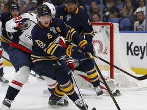 Buffalo Sabres forward Jack Eichel (15) looks for the puck during the first period of an NHL hockey game against the Washington Capitals, Tuesday Nov. 7, 2017, in Buffalo, N.Y. (AP Photo/Jeffrey T. Barnes)