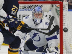 Tampa Bay Lightning goalie Andrei Vasilevskiy (88) keeps his eyes on the puck during the first period of an NHL hockey game against the Buffalo Sabres, Tuesday Nov. 28, 2017, in Buffalo, N.Y. (AP Photo/Jeffrey T. Barnes)