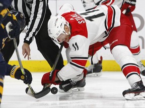 Carolina Hurricanes forward Jordan Staal (11) takes a faceoff during the first period of an NHL hockey game against the Buffalo Sabres, Saturday, Nov. 18, 2017, in Buffalo, N.Y. (AP Photo/Jeffrey T. Barnes)