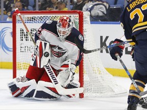 Buffalo Sabres' Johan Larsson (22) is stopped by Columbus Blue Jackets goalie Sergei Bobrovsky (72) during the first period of an NHL hockey game, Monday Nov. 20, 2017, in Buffalo, N.Y. (AP Photo/Jeffrey T. Barnes)