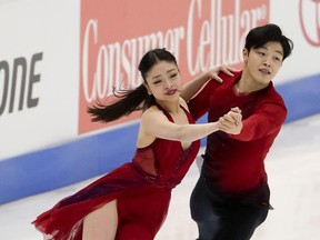 Maia Shibutani and Alex Shibutani, of the United States, perform during the ice dance free dance at Skate America, Sunday, Nov. 26, 2017, in Lake Placid, N.Y. (AP Photo/Julie Jacobson)
