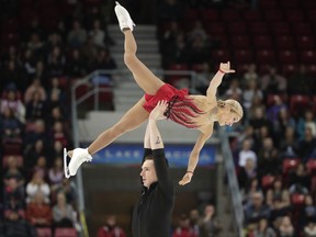 Aliona Savchenko and Bruno Massot, of Germany, perform during the pairs short program at Skate America, Friday, Nov. 24, 2017, in Lake Placid, N.Y. (AP Photo/Julie Jacobson)