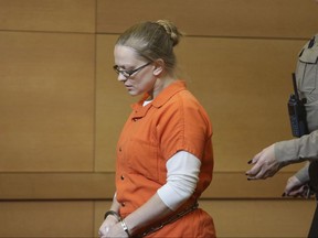 Angelika Graswald leaves the courtroom after sentencing, Wednesday, Nov. 8, 2017, in Goshen, N.Y. Graswald, who admitted removing a plug from her fiance's kayak in 2015 before it capsized in the Hudson River, but maintained that she was falsely accused of intentionally causing his death, was sentenced Wednesday to up to four years in state prison. (Jim Sabastian/Times Herlad-Record via AP, Pool)
