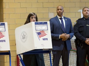 Republican mayoral candidate Nicole Malliotakis votes, Tuesday, Nov. 7, 2017, in the Staten Island borough of New York. Voters in New York City are poised to decide whether to give Mayor Bill de Blasio a second term leading the nation's largest city. De Blasio's toughest challenger is Malliotakis. (AP Photo/Mark Lennihan)