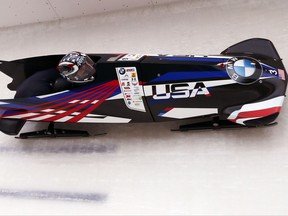 Driver Elena Meyers Taylor of the United States, rounds a curve at during the women's two-person World Cup bobsled race in Lake Placid, N.Y., on Thursday, Nov. 9, 2017. (AP Photo/Peter Morgan)