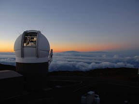 This undated photo made available by the University of Hawaii shows the Pan-STARRS1 Observatory on Haleakala, Maui, Hawaii at sunset. In October 2017, the telescope discovered an object from another star system that's passing through ours. It was given the name "Oumuamua," which in Hawaiian means a messenger from afar arriving first. (Rob Ratkowski/University of Hawaii via AP)