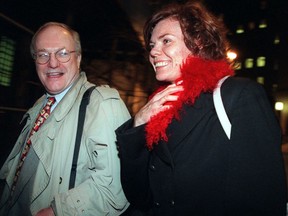 FILE - In this Dec. 7, 1999, file photo, attorney Michael Carey, left, and his client Anette Sorensen leave New York's U.S. District court after the second day of trial of her $20 million lawsuit against the city. The jury awarded her $66,000, rejecting many of her claims but agreeing that she should not have been strip-searched, among other findings. The Danish mother, whose 1997 arrest for leaving her baby outside a New York eatery sparked an international debate about parenting, says she still feels she was unfairly vilified. (AP Photo/Diane Bondareff, File)