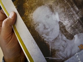This Tuesday, Oct. 31, 2017, photo shows a picture of Flora Stevens from a 1975 job application used to help solve a missing persons case in Monticello, N.Y. Stevens, who disappeared from upstate New York after being dropped off for a doctor's appointment 42 years ago, has been found suffering from dementia and living in an assisted-living facility near Boston, Mass., authorities said. (AP Photo/Seth Wenig)