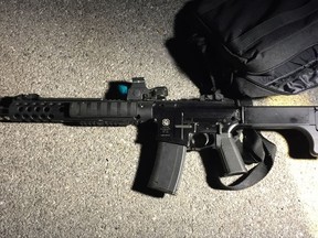 In this Tuesday, Nov. 14, 2017 photo provided by the Cheektowaga Police department is a weapon used in a shooting in Cheektowaga, N.Y. Authorities say it's a "miracle" that more people weren't shot when a man with two semi-automatic rifles opened fire on a suburban Buffalo retail store, wounding one man before being tackled by police.   Police identified the suspect as Travis Green, 29, of Cheektowaga. He was arraigned Wednesday, Nov. 15, 2017 in town court on charges that included attempted murder, assault, criminal use of a firearm and resisting arrest.  (Cheektowaga Police Department via AP)
