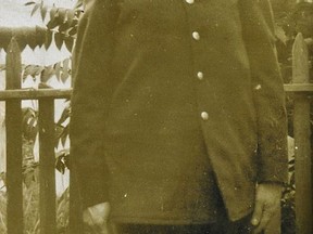This undated photo provided by Arthur O'Brien shows his grandfather Thomas O'Brien in his fireman's uniform after he joined the FDNY in 1917. O'Brien's heirs say their grandfather was found dead in his firehouse bunk hours after suffering a six-inch skull fracture at a Manhattan fire in 1935 and should be honored as a "line-of-duty" casualty. (Courtesy of Arthur O'Brien via AP)